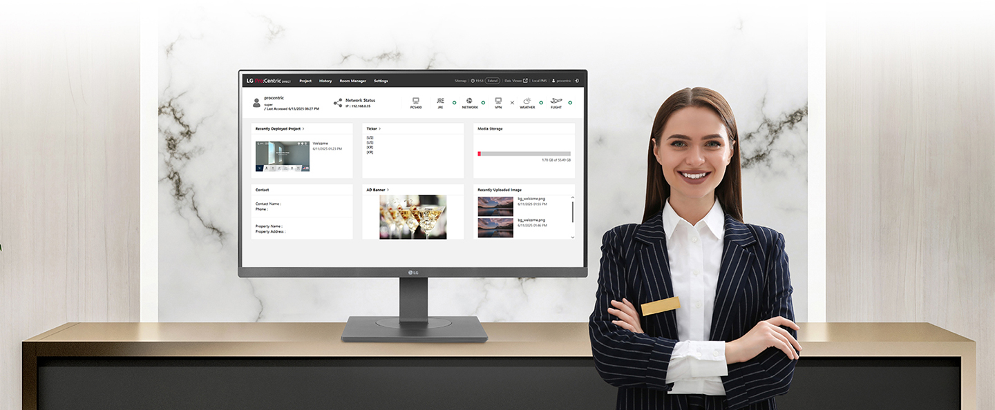 The image shows a monitor displaying LG Pro:Centric Direct, accompanied by a hotelier with a smile on her face.